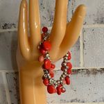 Red Beaded Slip On Elastic Bracelet with Silver Charms Photo 0