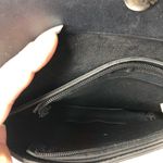 Black Crossbody Purse with Silver Ring and Tassel Photo 4