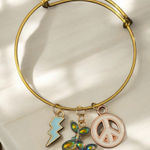 Balloon Dog Bracelet with Peace and Lightning Charms Gold Photo 0