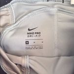 Nike Pro Gray Shorts with Neon and Purple Accents Photo 1