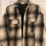 Altar'd State Very cute, oversized, shacket. Perfect to pair with a dress and thigh high boots Photo 1