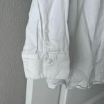 H&M White button-up shirt with a relaxed fit Photo 1