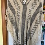 Mudd Poncho, Gently Used Photo 0
