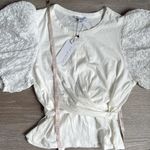 Anthropologie NEWAnthropologie current air contrast puff sleeves tie top white Medium Photo 5