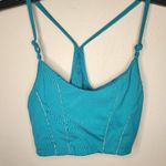 Nike  Women's Yoga Indy Light-Support Metallic Tape Sports Bra Photo 2