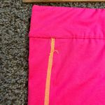 Head  hot pink athletic shorts Photo 1