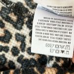 American Eagle Outfitters cheetah print lettuce trim ribbed short sleeve top Photo 6