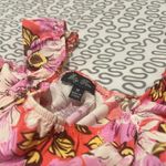 Lila Rose Preloved floral ruffle sleeve top. Photo 7