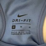 Nike Women's Dri-Fit Blue and Black Racerback Sports Bra Size Medium Photo 4