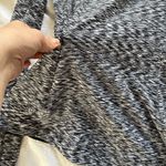 Lululemon Women’s  Gray Long Sleeve activewear shirt with zippered pockets Photo 9