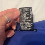 Premise  royal blue size small 3/4 sleeve shark bite hem neck cutouts worn 1x EUC Photo 5