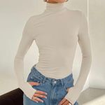 Princess Polly Turtleneck Photo 0