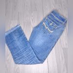 Almost Famous Y2K Women’s Embroidered Low Rise Bootcut Distressed Jeans Photo 3