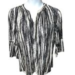 Gloria Vanderbilt Maurice’s cute black and white tunic with bell sleeves! New Photo 0