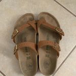 Birkenstock  Tan Sandals with Gold Buckles Photo 3