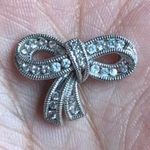 Zales  Diamond Sterling Silver Bow Pendent Photo 0