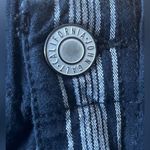 Brandy Melville black and grey striped pants. They would probably fit a size 0. Photo 3