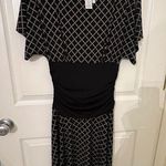 Donna Morgan  Dress Vintage Short-sleeved Classic Stretch Fit & Flair. Photo 0