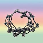 Fossil  multi cord bracelet with silver flowers and discs Photo 1