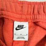 Nike  Sportswear Women’s Mid-Rise Joggers Photo 3