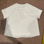 Under Armour Women's white loose baggy short sleeve too Photo 7
