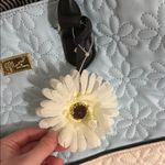 Betsey Johnson NWOT Betsy Johnson blue and white floral two tone tote bag with flower charm Photo 2