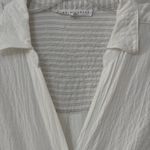 Elegant White Button Photo 6