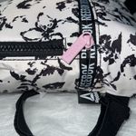 Reebok  Women's Rose Mini Backpack
Black Floral with White.H8.5xW6.5”xD3.5”NWT Photo 6