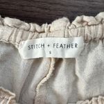 Stitch and feather shorts size small Photo 1