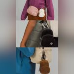 Lululemon Nano Clip-On Backpack Fleece in colors Light Ivory/Burnt Caramel. Photo 1