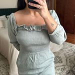 Vestique Romper Photo 1