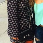 Romeo + Juliet Couture Off the shoulder romper, black red and white. Photo 2