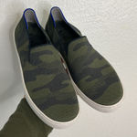 Rothy's The Original Slip On Sneaker in an olive green and navy camo pattern Photo 0