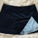 Champion thigh zip slit active shorts under skirt Photo 0