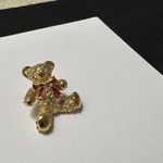 Avon Lapel Tack Pin Gold Tone Teddy Bear / Red Enamel Bow Christmas Bell NWOT Photo 1