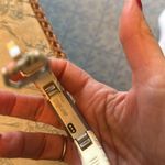 Fitbit barely used. As is. No idea what model. Cute band purchased separately Photo 1