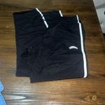 Young Living Black Joggers with White Accent Photo 1