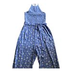 American Eagle OMG How cute is this jumpsuit, blue with small white flowers, smocked halter top, matching belt, has side hand pockets, excellent condition, size small Photo 3