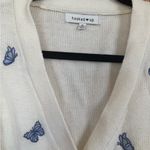 Women’s Medium Short Sleeve Sweater by Hooked Up. Butterfly detail. White Photo 3