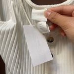 NWOT cream faux button body suit size small White Photo 4