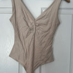 Elodie  Nordstrom tan beige nude button sleeveless bodysuit Photo 0