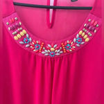 Thalia Sodi  of Macy’s hot pink sleeveless blouse with colorful stud detail. Photo 1