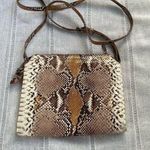 A New Day snakeskin print crossbody bag. Photo 0