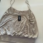 EXPRESS Tan and cream cami top #camitop #y2kstyle  #model #nyc  2000s, chic, tank top, spaghetti strap, clean girl, neutrals Photo 2