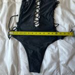 Black one piece with open sides Photo 6