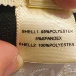 Faith and joy NEW  Collared Black shirt size small Shell 95% polyester 5% spandex Shell 2 100% polyester Photo 5