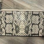 A New Day Faux Leather Zip Around Wallet, zip closure, side slots for credit cards, side pocket, length is 7, width is 3.5 Photo 2