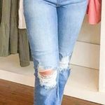 Sneak peek light wash ripped jeans Size 25 Photo 4