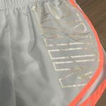 Nike Running Shorts Size Small Shimmer White Orange Athletic Gym Photo 1