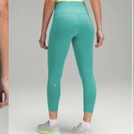 Lululemon  Wunder Train HR Tight w Pockets 25” Blaze Maldives Green 12 Photo 3